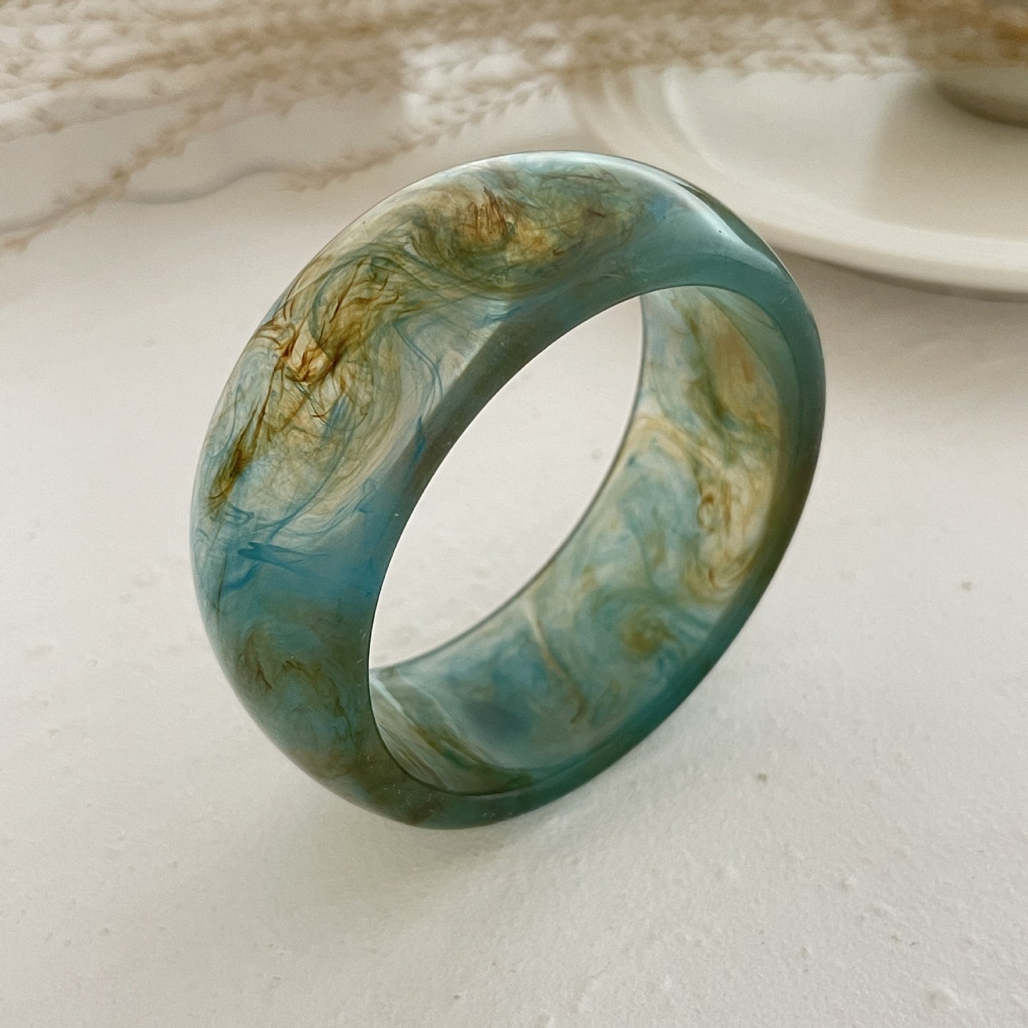 Planderful Vienna Verve Translucent Acrylic Wide Bracelet For Women With Irregular Round Statement Design
