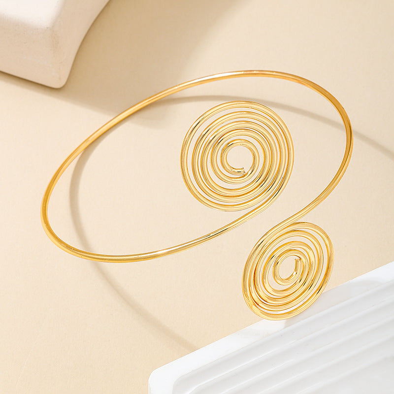 Golden Spiral Arm Ring for Women by Planderful Fashion Statement