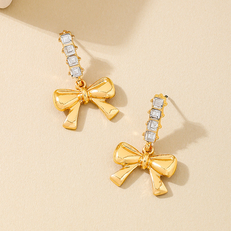 Planderful Vienna Verve Earrings – Charming Metal Bow Design with Dazzling Zircon