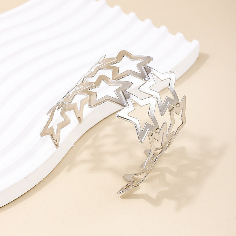 Exaggerated Wide-Face Hollow Star Bracelet in Metal - Vienna Verve Collection