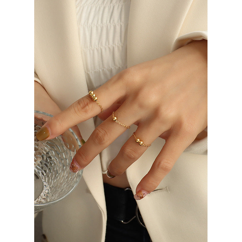 Lucky Minimalist Greek Steel Ball Ring with Gold Accent