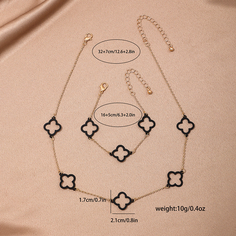 Stylish Modern Black Hollow Clover Metal Jewelry Set with Necklace and Bracelet