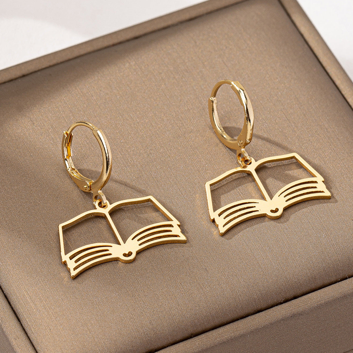 Planderful Vienna Verve Earrings – Stylish Hollow Book Design
