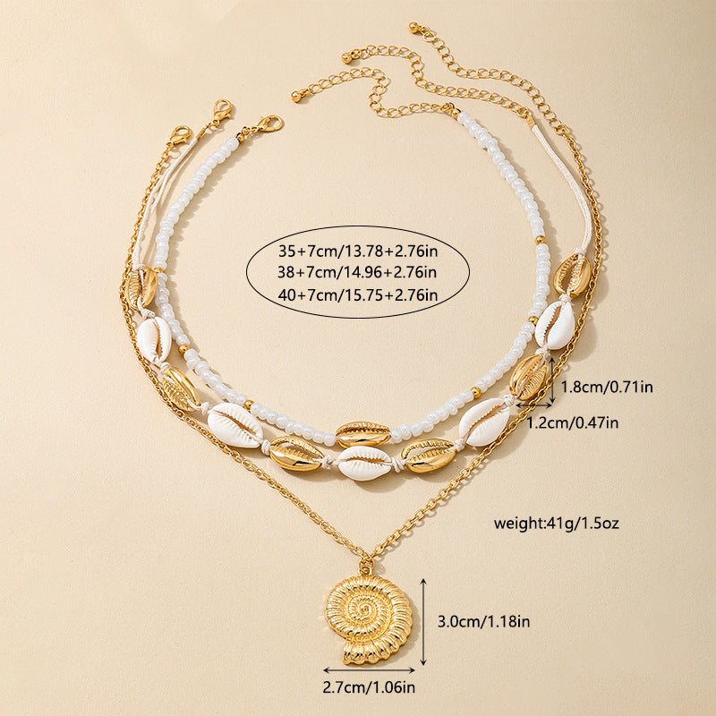 Planderful Vienna Verve Necklace – Beachy Chic Metal Conch Shell Design