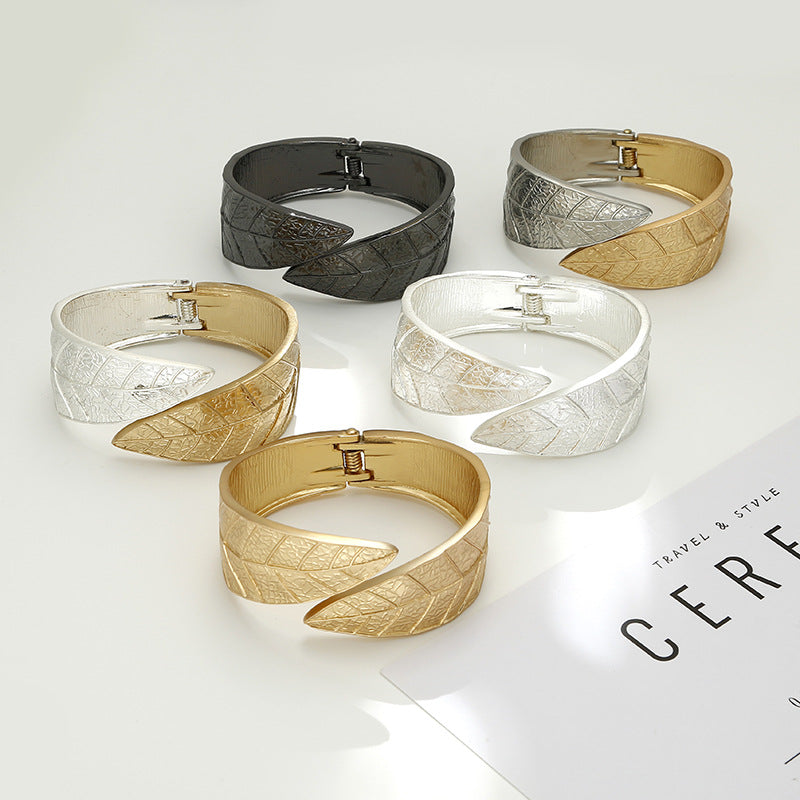 Vienna Verve Exaggerated Silver Bracelet with Leaf Design