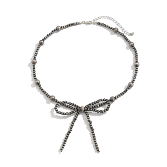 Planderful Vienna Verve Necklace – Handmade Ethnic Turquoise Bow Design