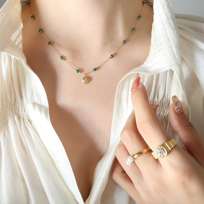 Glamorous 18K Gold Plated Stainless Steel Necklace with Crystal Beads and Scallop Pendant