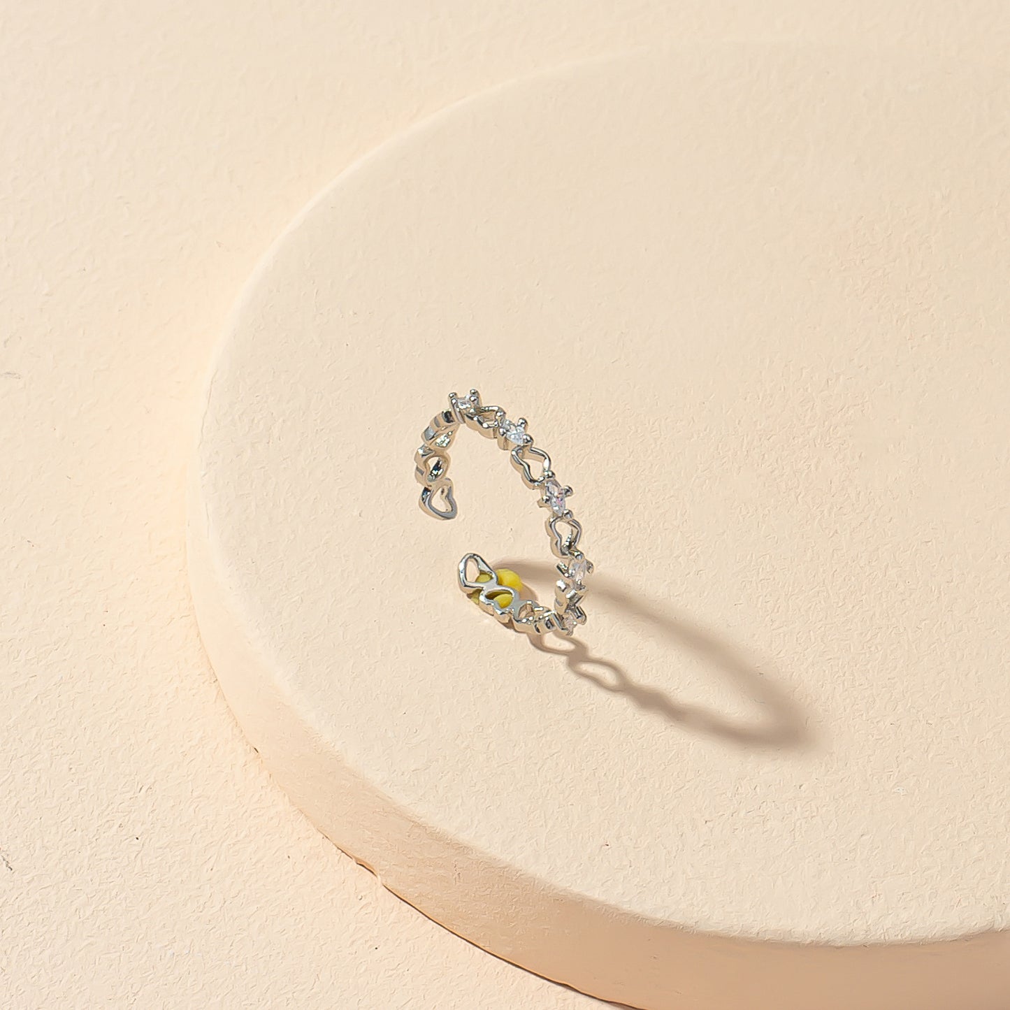 Heartfelt Elegance: Contemporary Heart Opening Ring with a Twist