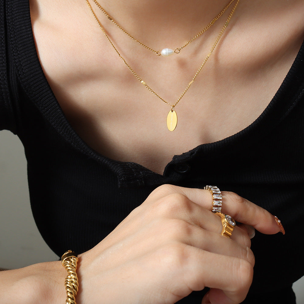Elegant Multi-Layer Pearl Necklace with Gold Lock Bone Chain