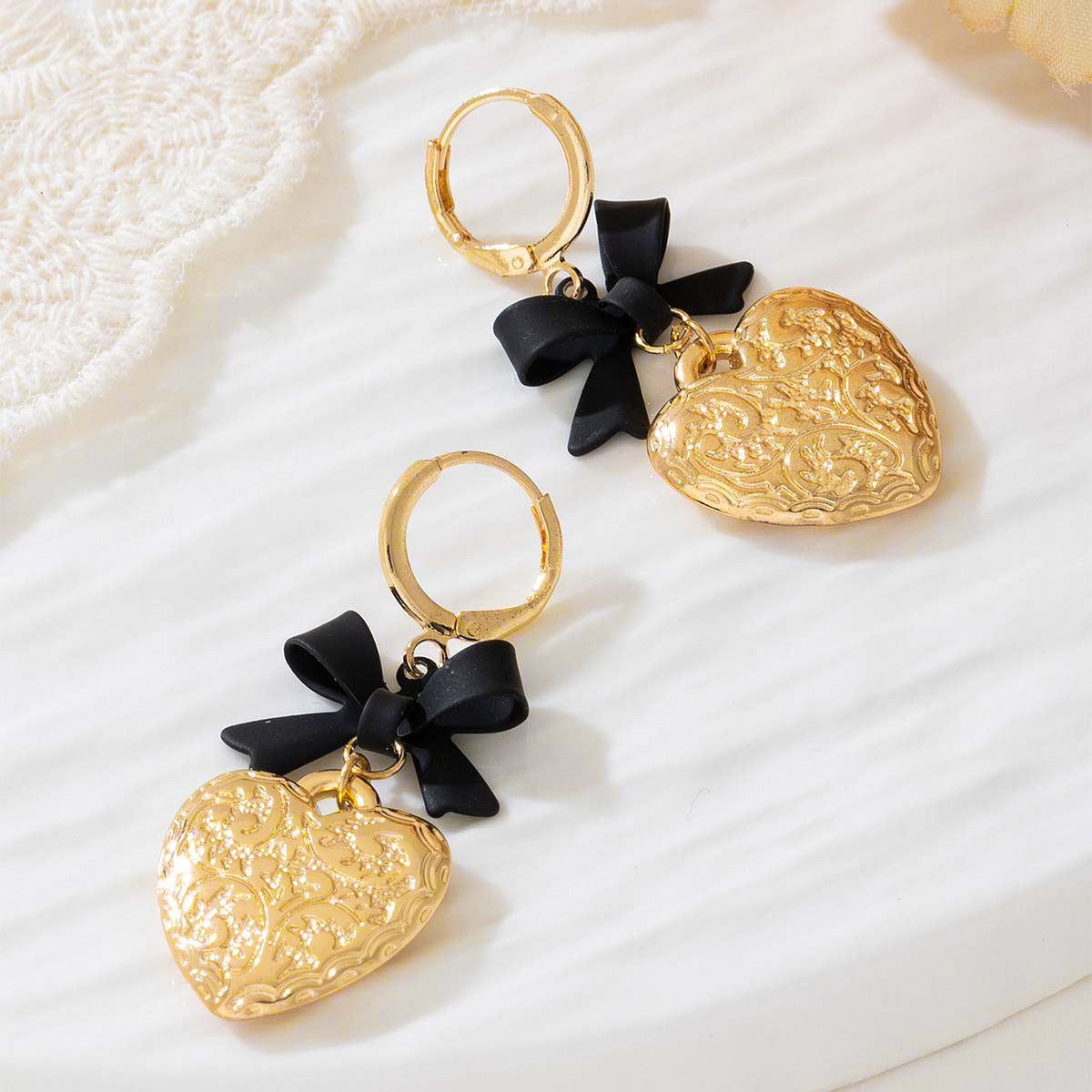 Planderful Vienna Verve Earrings – Elegant Metal Love Bow Design