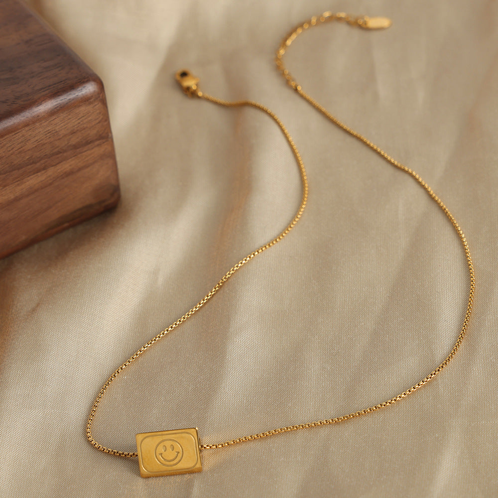Geometric Elegance: Titanium Steel Gold-Plated Necklace with Smiley Face Ornament