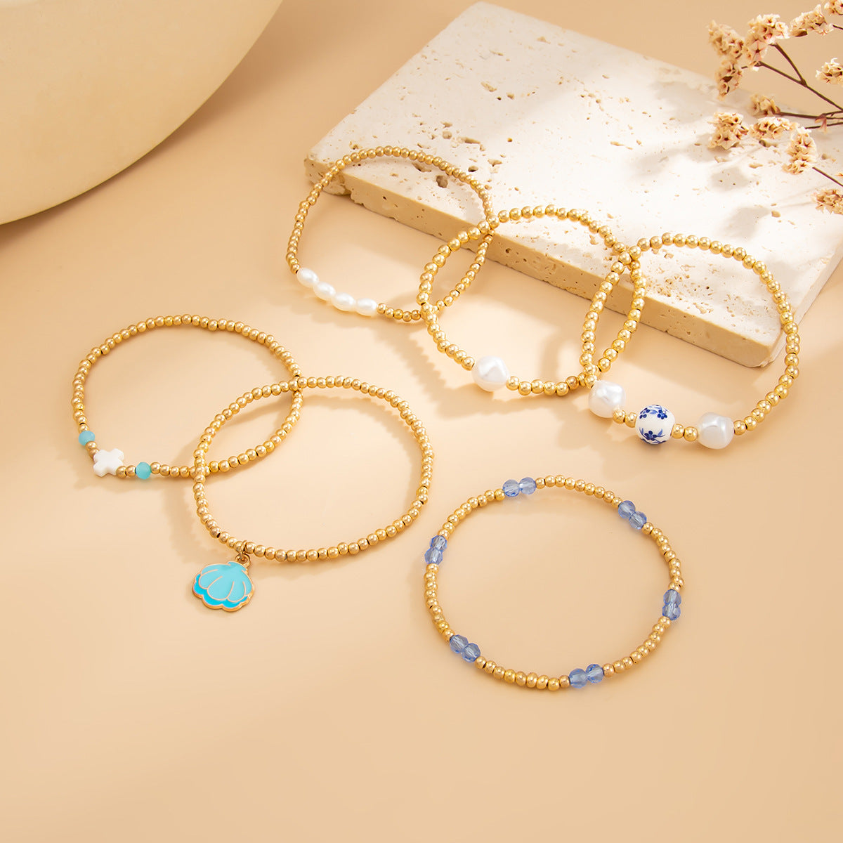 Blue And White Porcelain Beaded Bracelet With Elegant Cross Portrait Pendant For Women By Planderful Vienna Verve