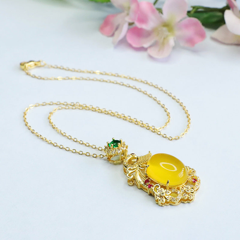 Yellow Phoenix Zircon Pendant Necklace with Chalcedony Egg