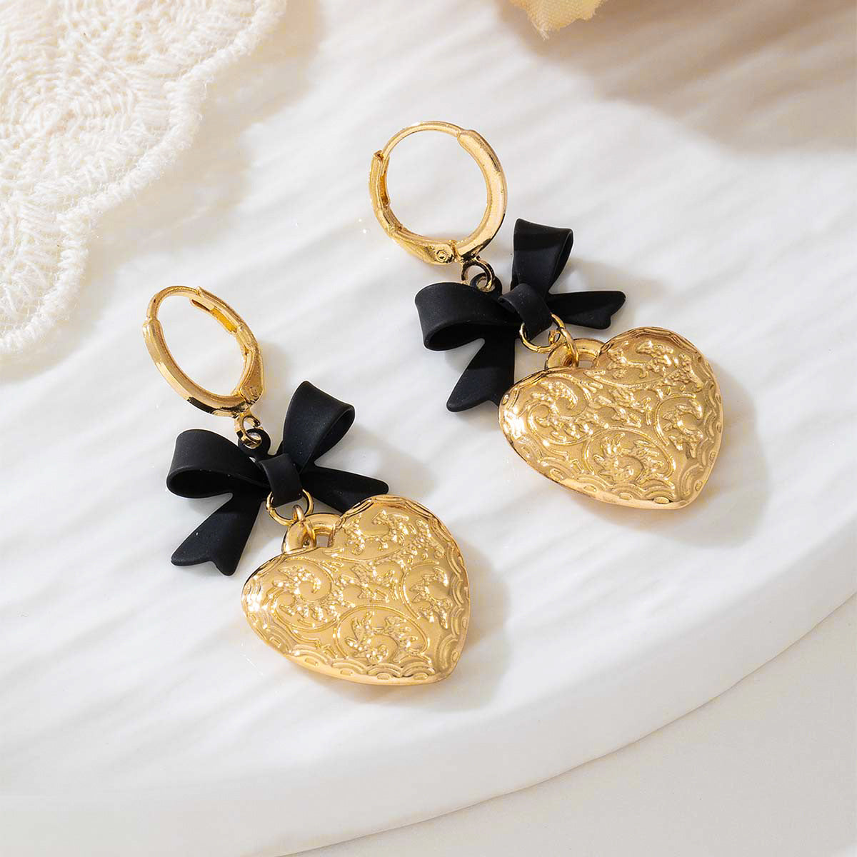 Planderful Vienna Verve Earrings – Elegant Metal Love Bow Design