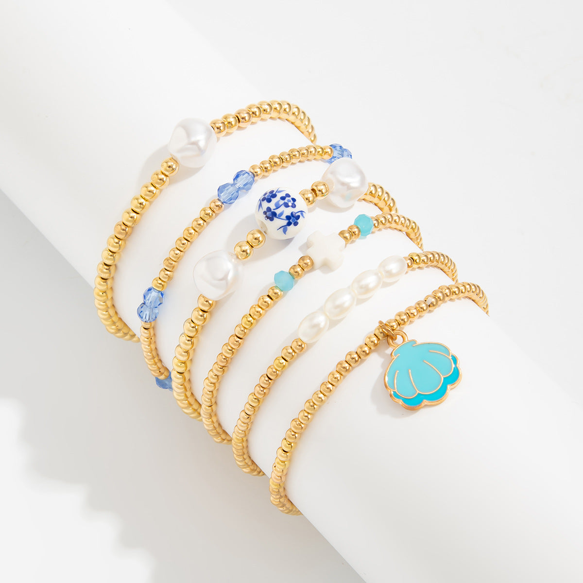 Blue And White Porcelain Beaded Bracelet With Elegant Cross Portrait Pendant For Women By Planderful Vienna Verve