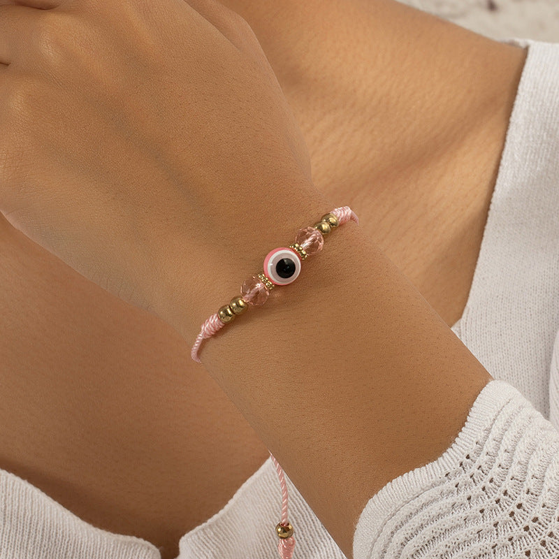 Vienna Verve: artisanal beaded rope bracelet with devil's eye charm