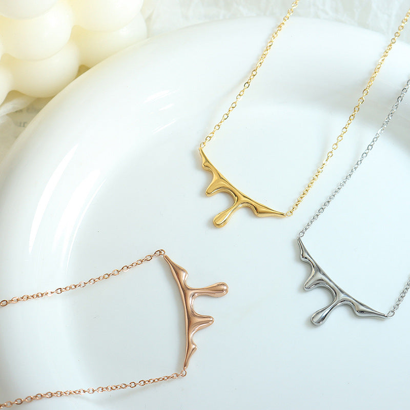 Luxurious 18K Gold Plated Water Drop Pendant Necklace with Lava Light Design