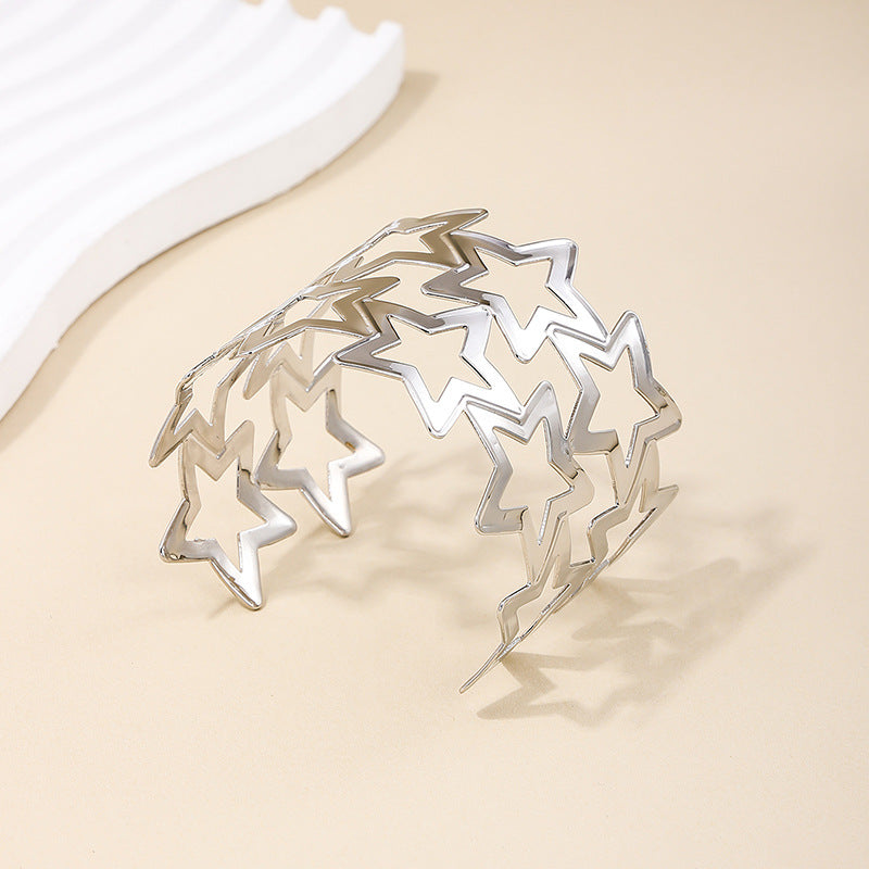 Exaggerated Wide-Face Hollow Star Bracelet in Metal - Vienna Verve Collection