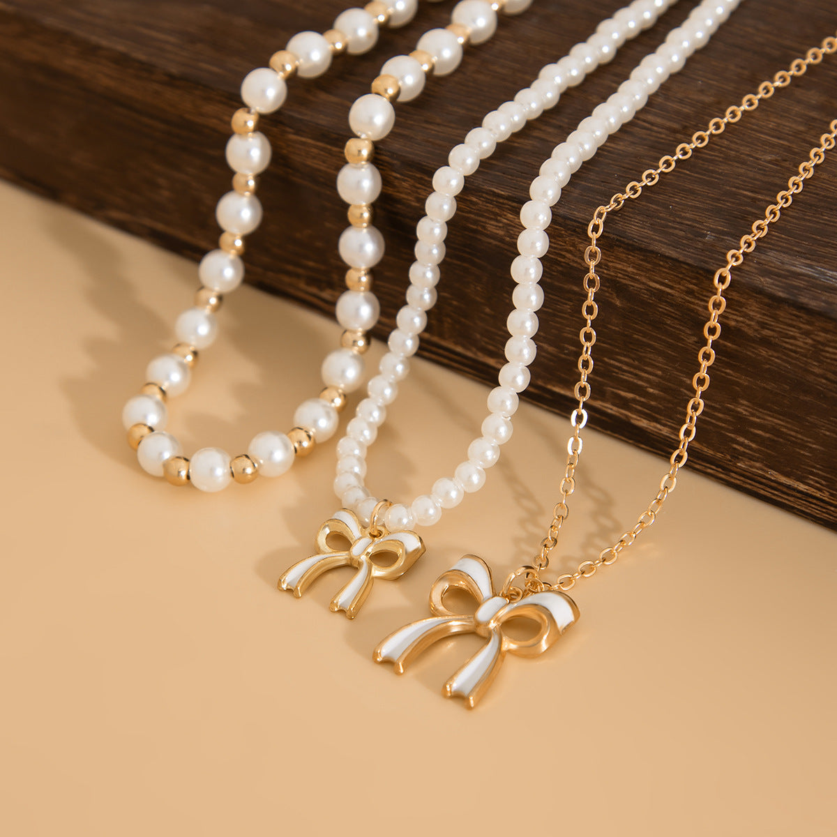 Layered Imitation Pearl Bow Tassel Necklace