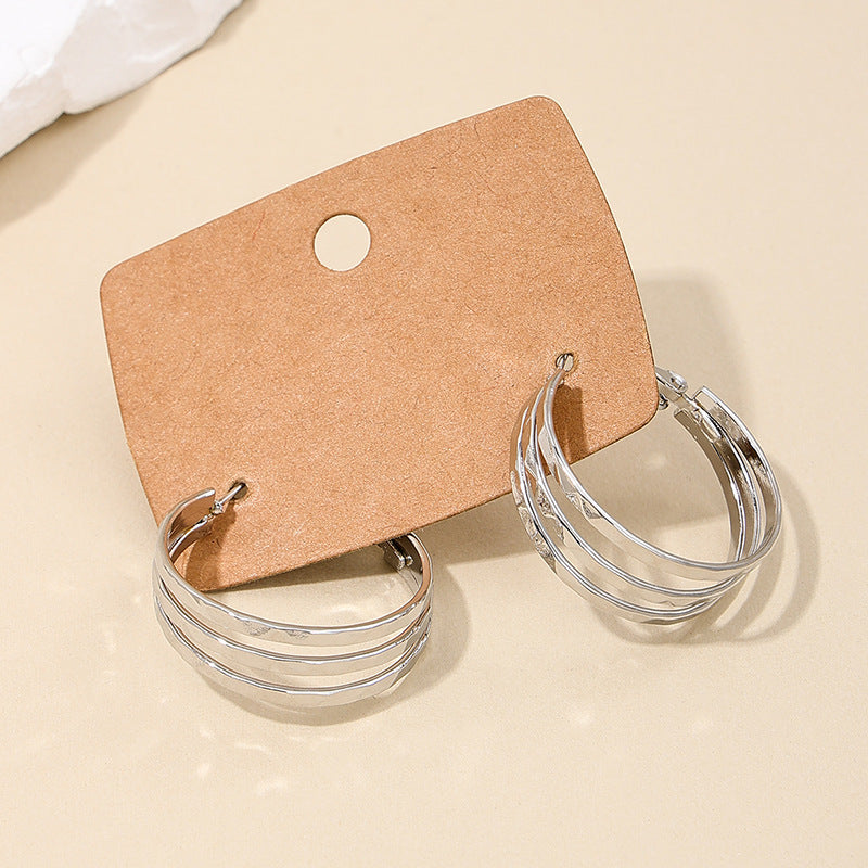 Retro Chic Metal Earrings with Unique Circle Design - Vienna Verve Collection