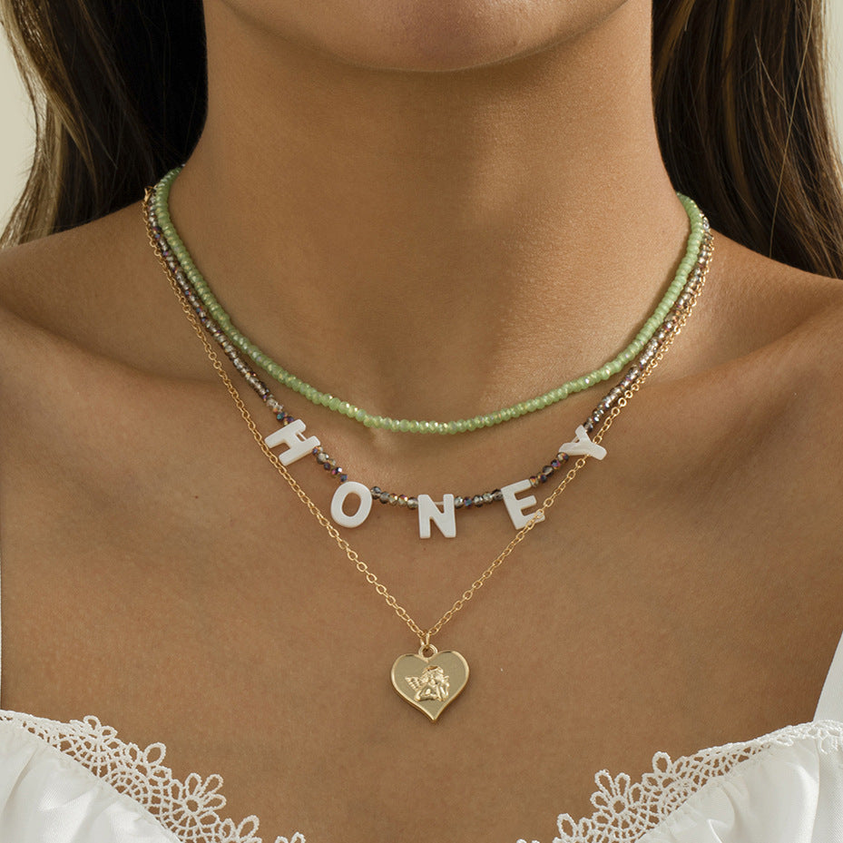 Honey Letter Necklace Stacked Portrait Beaded Heart By Planderful Vienna Verve For Women Chic Statement Jewelry