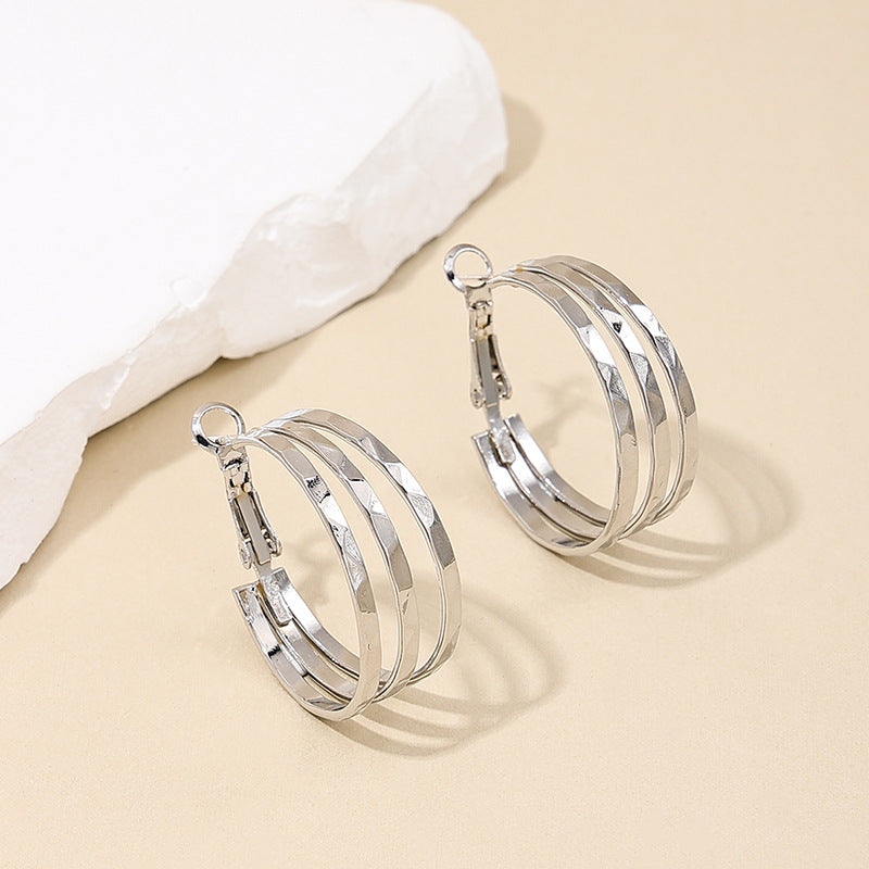 Retro Chic Metal Earrings with Unique Circle Design - Vienna Verve Collection