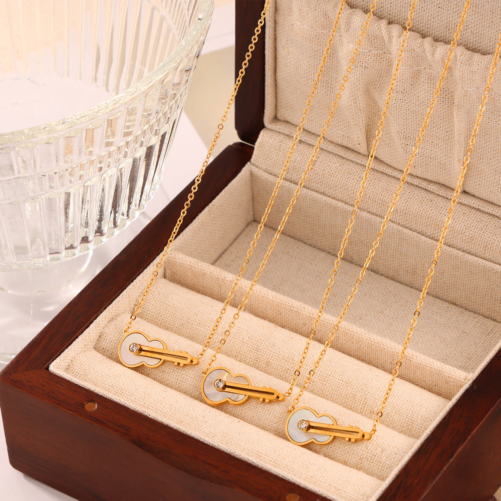 Elegant Violin Necklace with White Shell and Zircon Design on Titanium Steel Chain