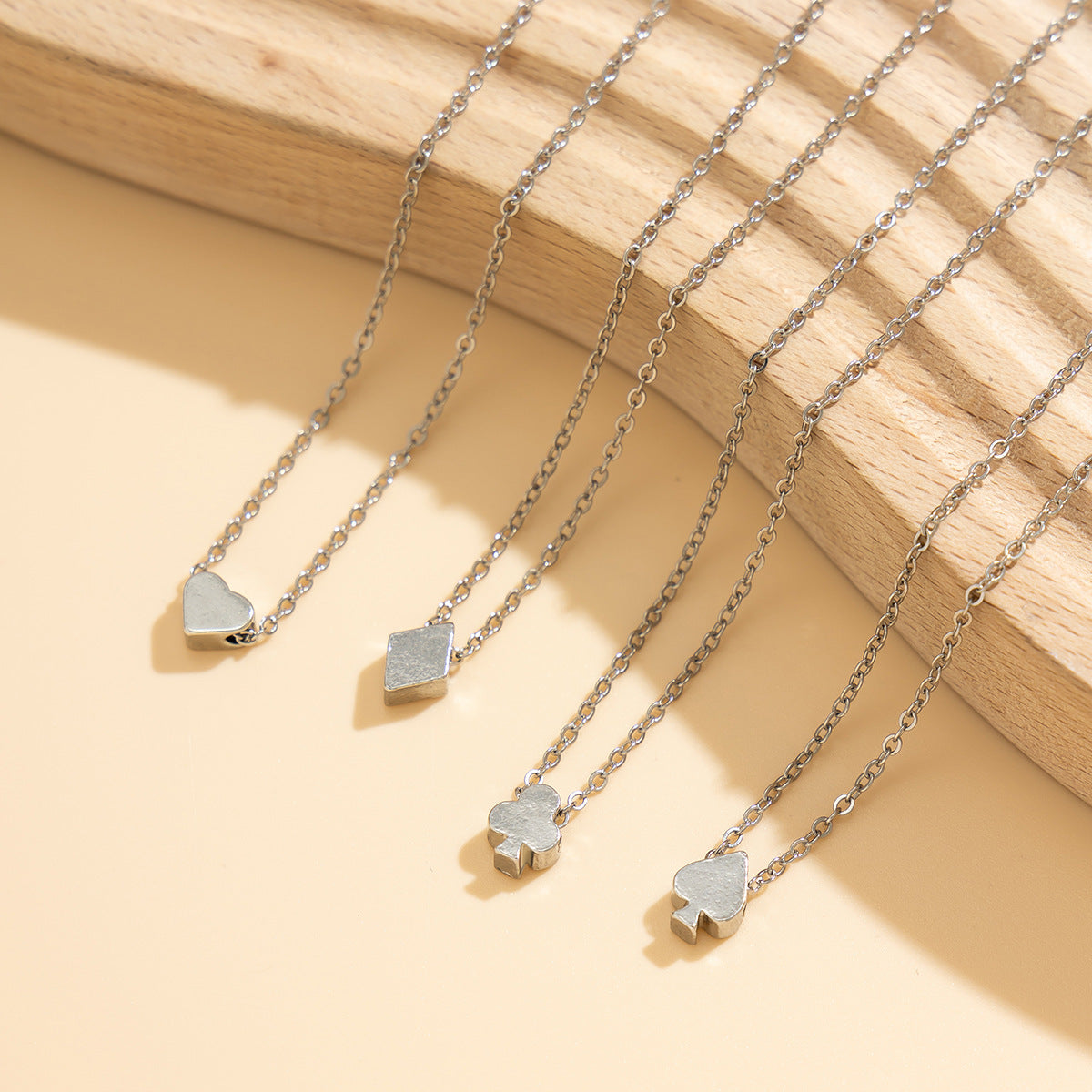 Heart Plum Metal Necklace with Poker Pendant Set from Europe and The United States.