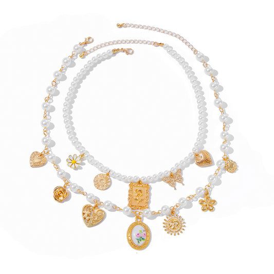 Planderful Vienna Verve Necklace – Elegant Pearl and Rose Bow Design