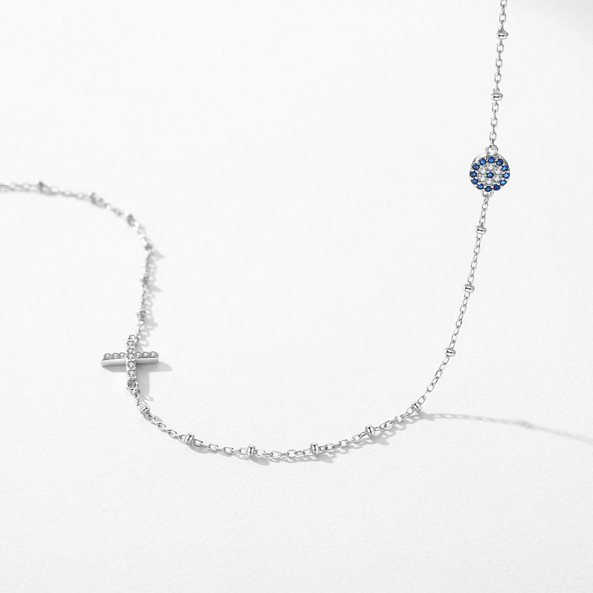 Chic Sterling Silver Blue Eye Necklace with Cross and Beaded Collarbone Chain
