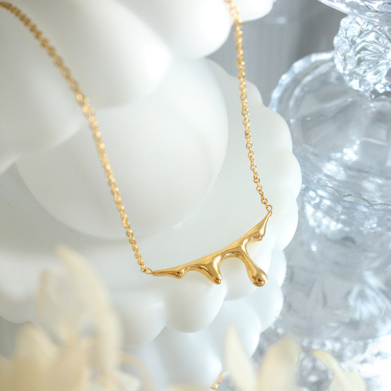 Luxurious 18K Gold Plated Water Drop Pendant Necklace with Lava Light Design
