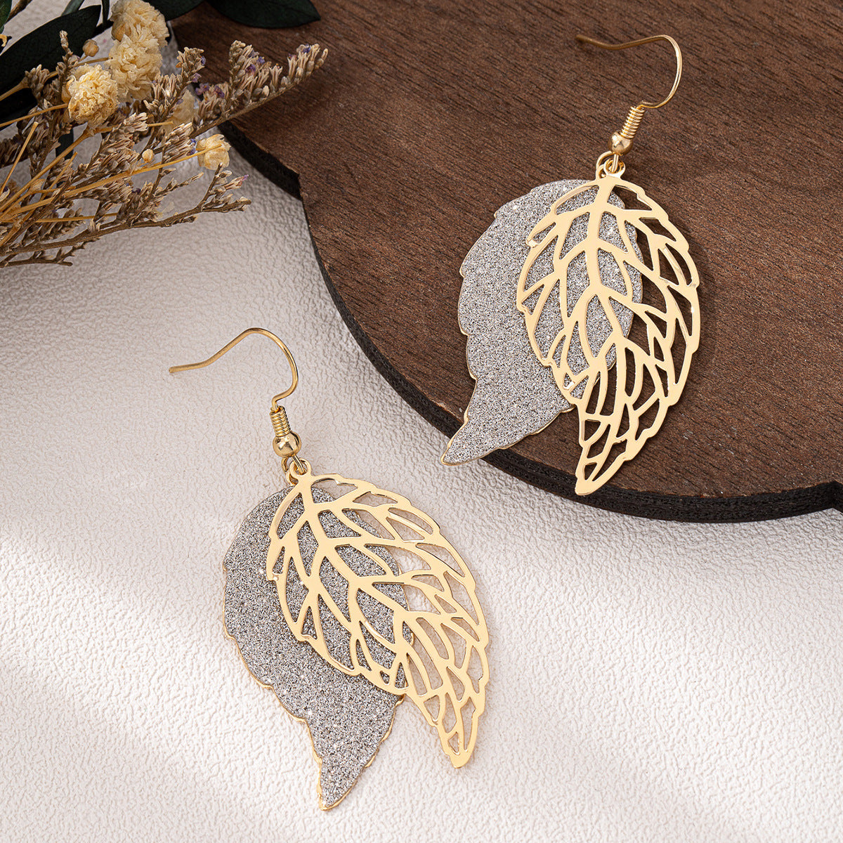 Planderful Vienna Verve Earrings – Stylish Metal Hollow Leaf Design