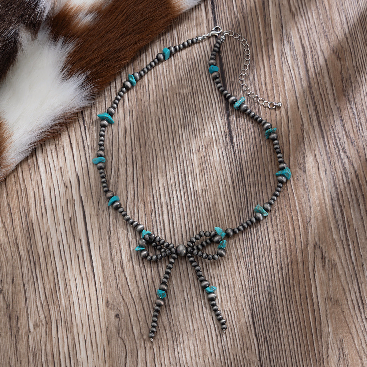 Planderful Vienna Verve Necklace – Handmade Ethnic Turquoise Bow Design