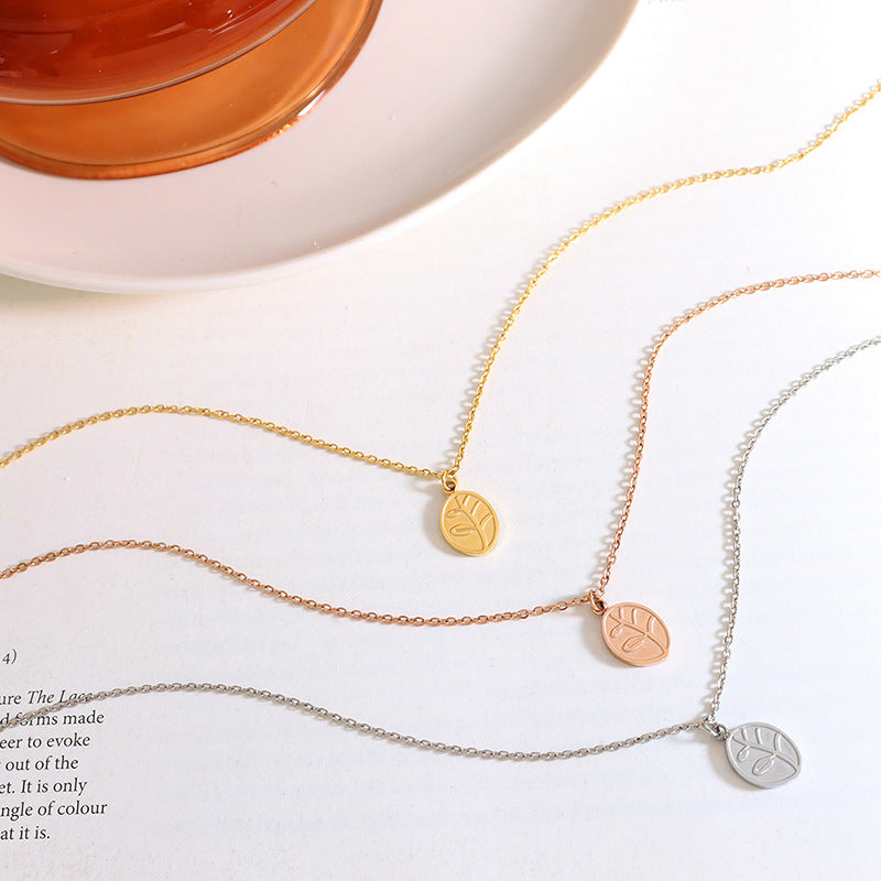 Golden Titanium Steel Instagram Wind Leaf Pendant Necklace for Women - Unique Collarbone Neckchain