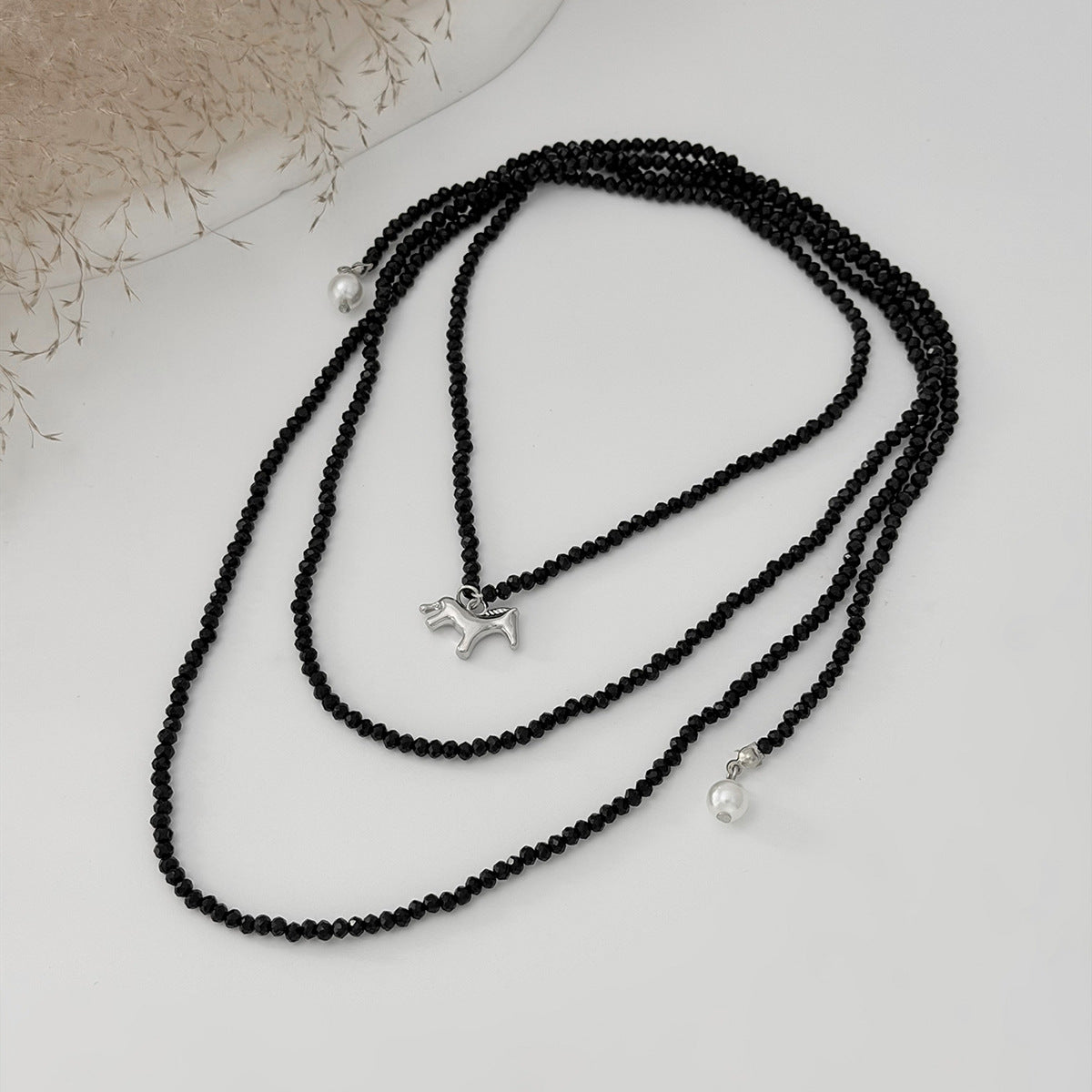 Long Winding Beaded Necklace Pearl Pony Pendant