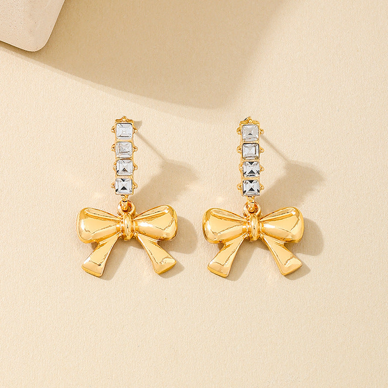 Planderful Vienna Verve Earrings – Charming Metal Bow Design with Dazzling Zircon