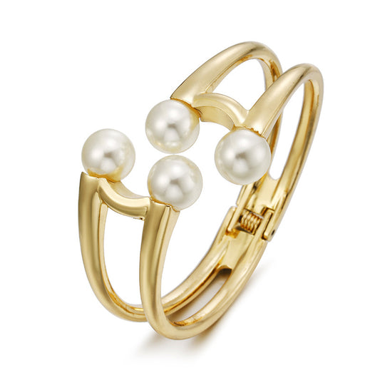 Mystique Pearl Bracelet - Exquisite Metal Bangle with Edgy Charm