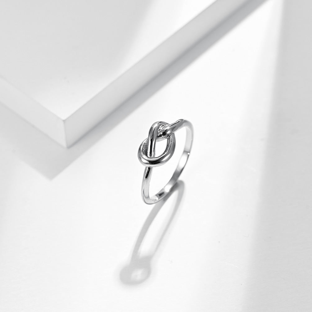 Steel Ring - Elegant Love Knot Stainless Steel Band For Proposals And Everyday Wear