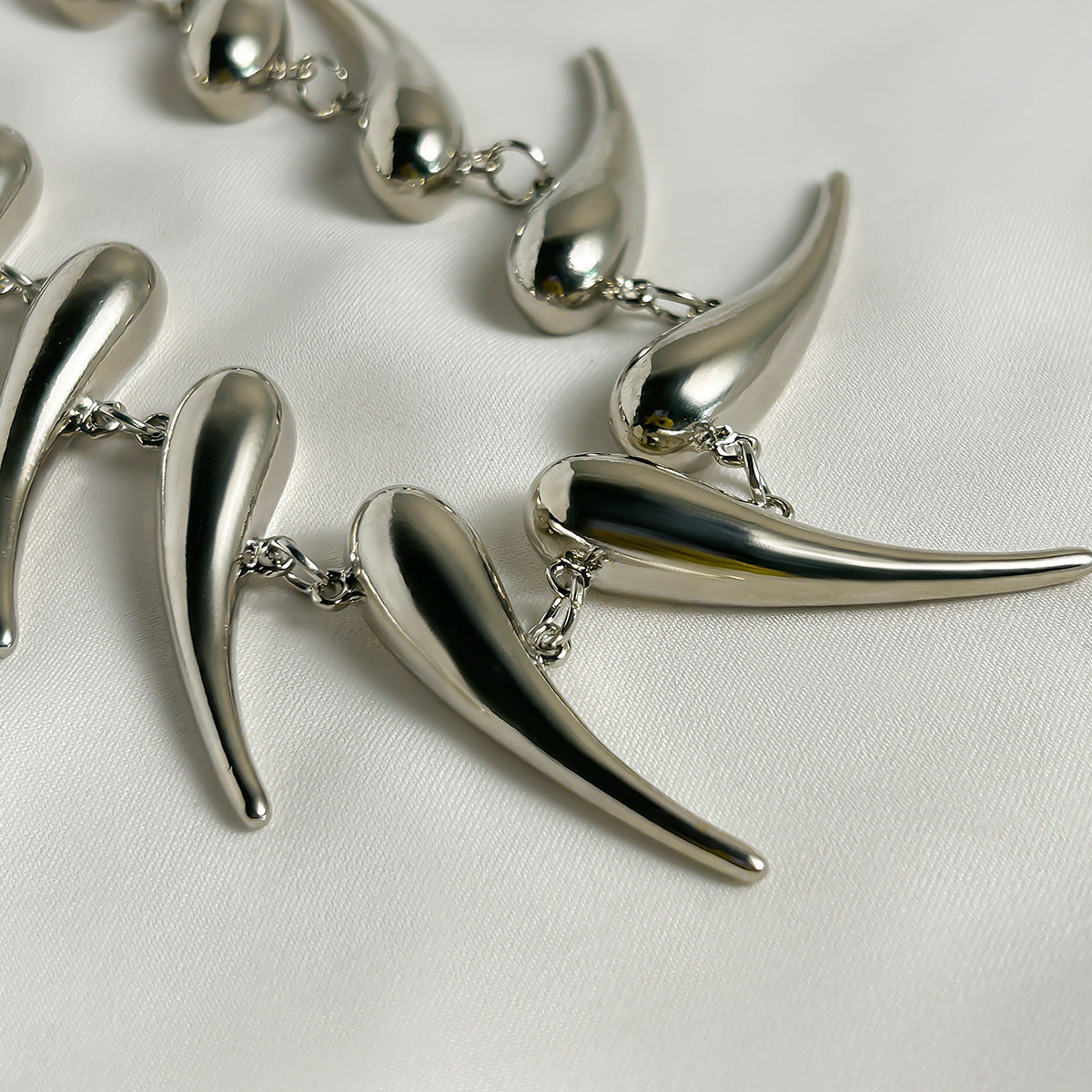 Exaggerated Glossy Thorn Pendant Necklace with Water Drop Detail - Vienna Verve Collection