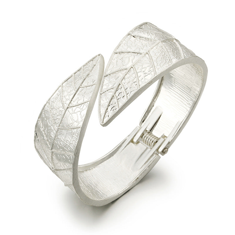 Vienna Verve Exaggerated Silver Bracelet with Leaf Design