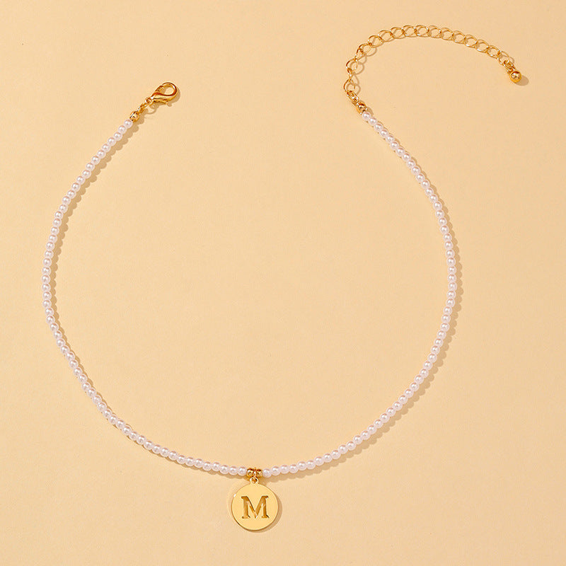 Elegant Hollow English Letter Pendant Necklace with Pearl Accents