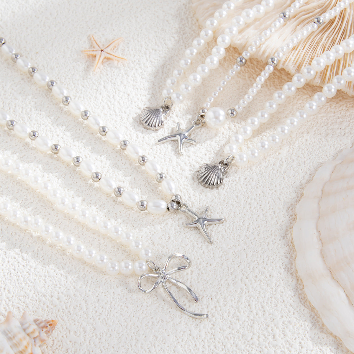 Pearl-Style Starfish & Bow Layered Necklace