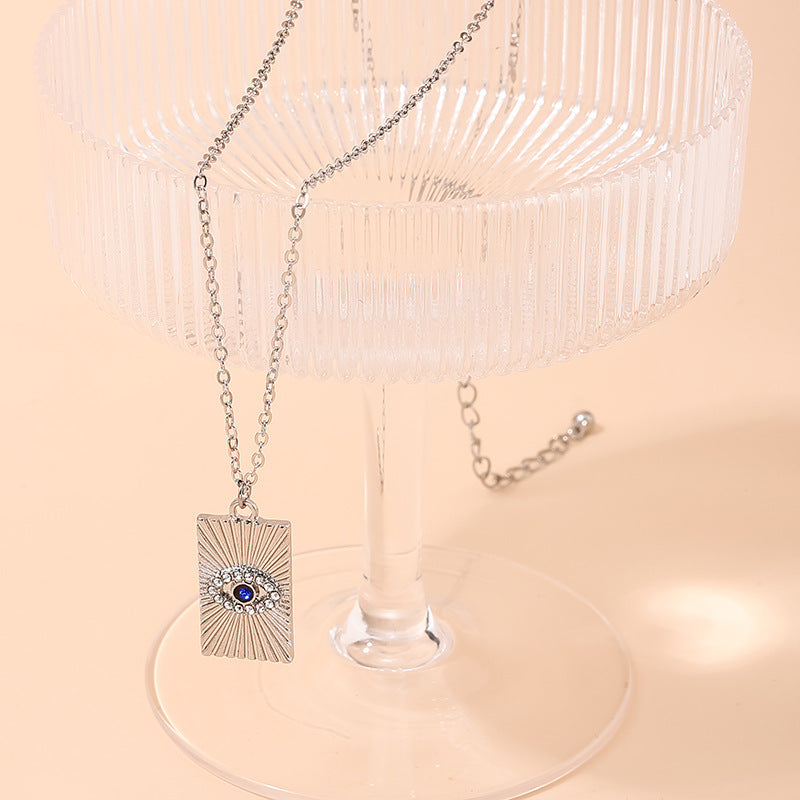 Retro Blue Diamond Pendant Necklace with a Tempting Devil's Eye Sparkle