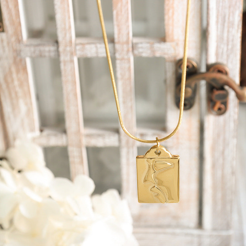 Golden Half-Face Portrait Pendant Necklace with Titanium Plating - European and American Jewelry Trend