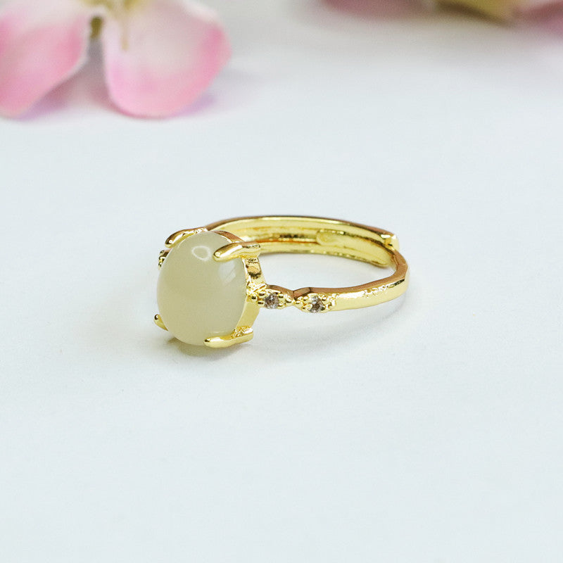 Oval Hotan Jade Ring with Evil Eye Zircon Opening and Adjustable Fit