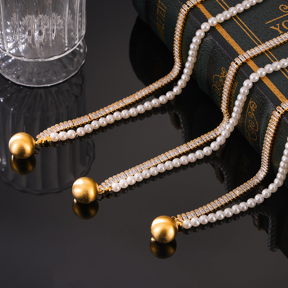 Elegant Copper Chain Pendant with Shell Bead and Zircon Detail