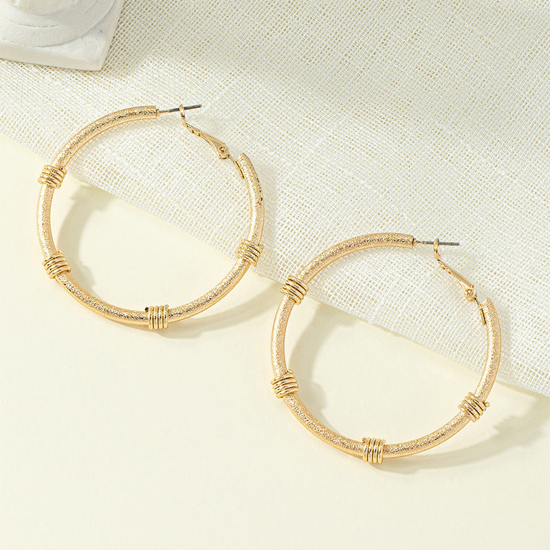 Vienna Verve Metal Circle Earrings with a Retro Touch