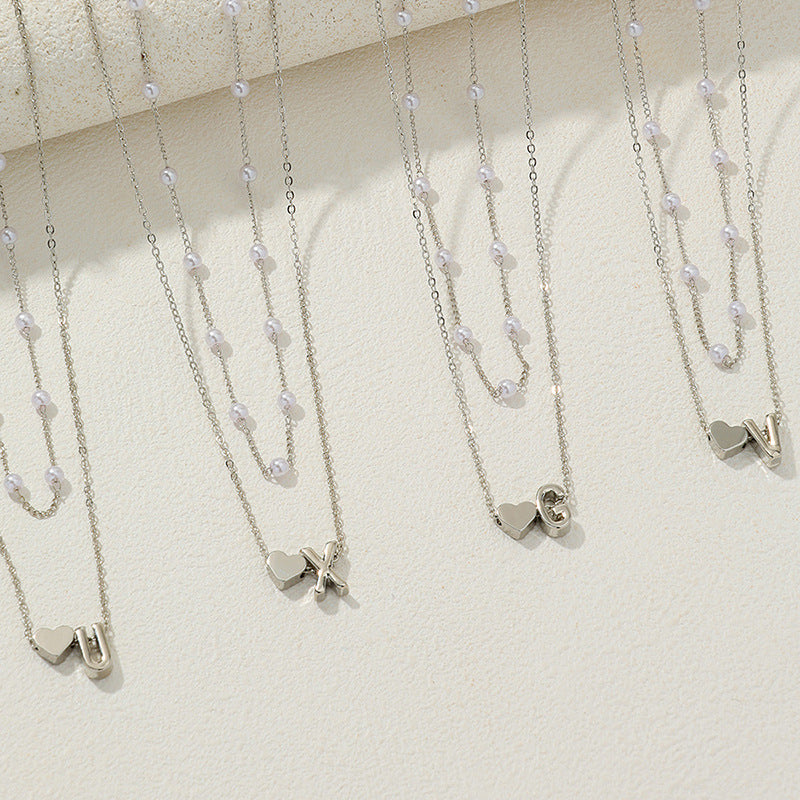 Elegant Pearl Collar Necklace with Metal Love Pendant