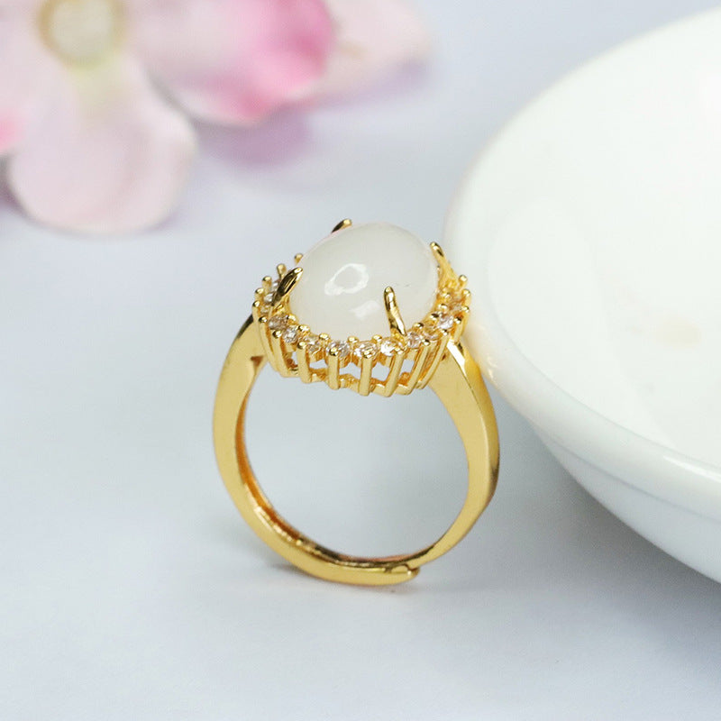 Exquisite Oval White Jade Ring with Zircon Halo
