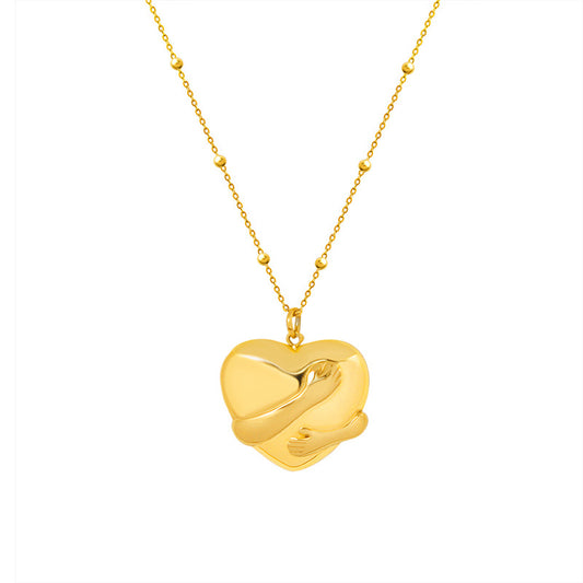 Fashion OL cross-border hot selling three-dimensional sense hand hugging love pendant clavicle chain plated gold necklace women's hand ornament